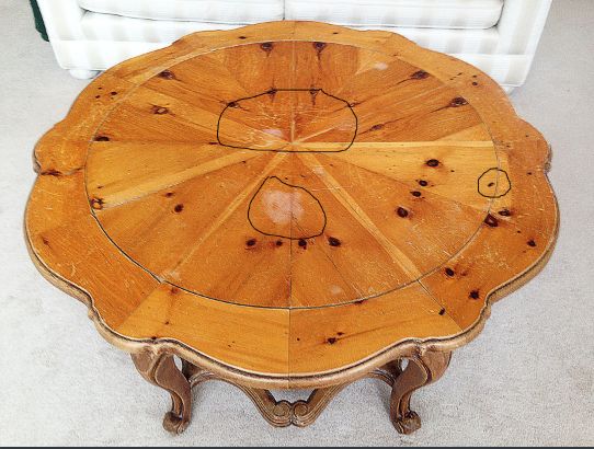 Jack's table with numerous deep stracthes, water m