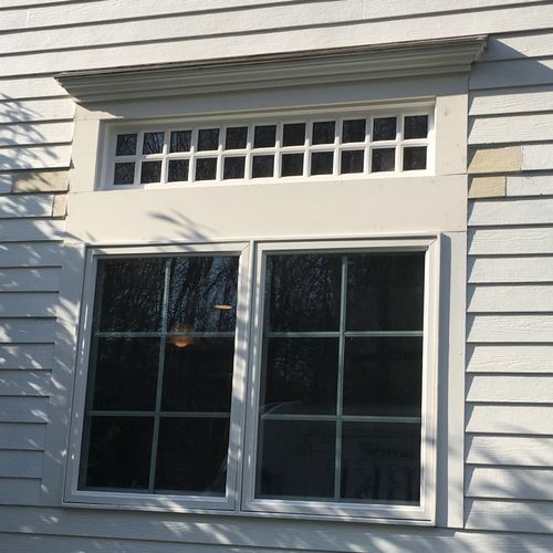 WE INSTALL ALL KINDS OF WINDOWS. THIS IS A TRANSOM