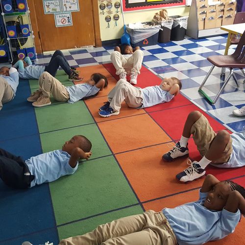 Kinesthetic sight words! Situps while reading thei