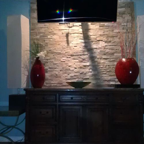 Mounted T.V. & installed back light with stone.