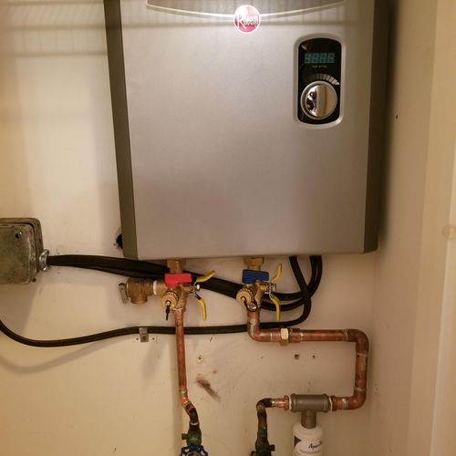 Tankless electric water heater replacement along w