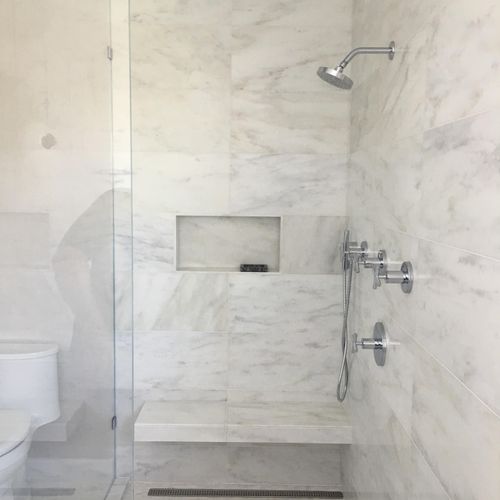 In this bathroom we created a curb-less shower for