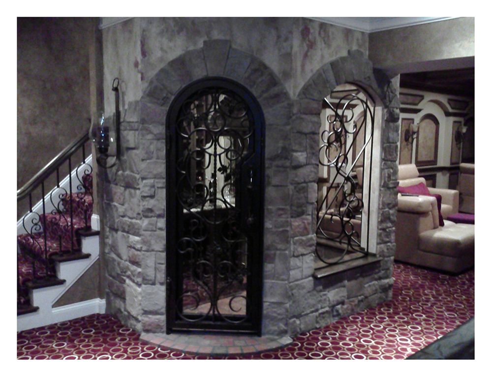 Custom wine cellar, with decorative cast iron, and