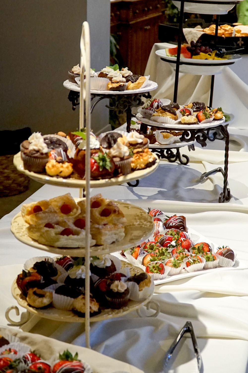 A selection of deserts and fruit.