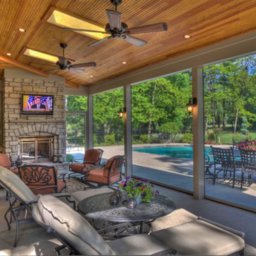 Poolside covered patio with retractable screen wal