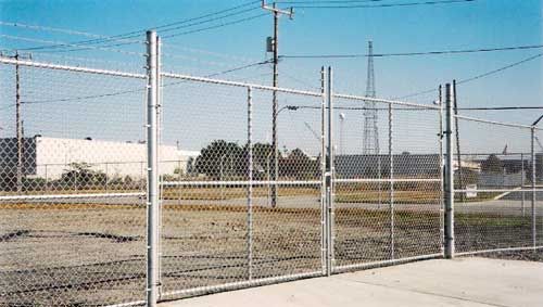 commerical gates with barbedwire