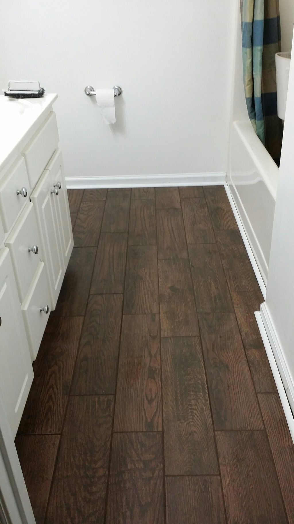 Wood Grain creamic tile Planks and trim.