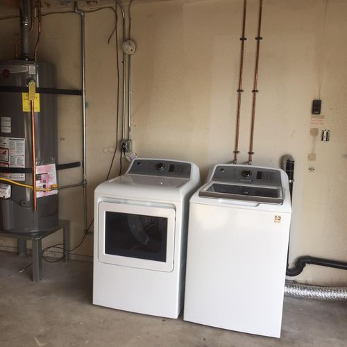 relocate washer/ dryer/ water heater to garage
