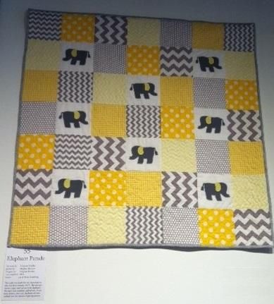 Nursery quilt featuring applique elephants. Free m