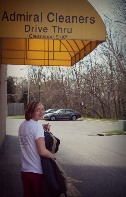 Team member Brittany doing dry cleaning pick-up