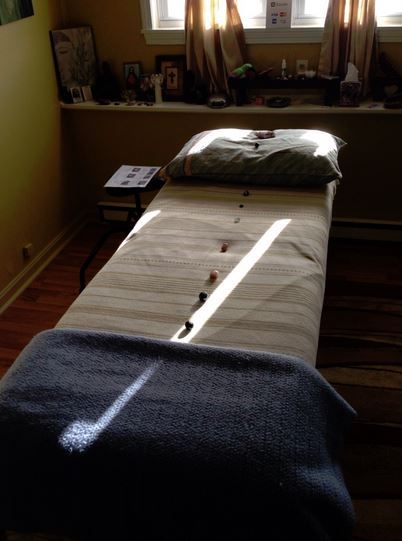 Reiki Table with Chakra crystals