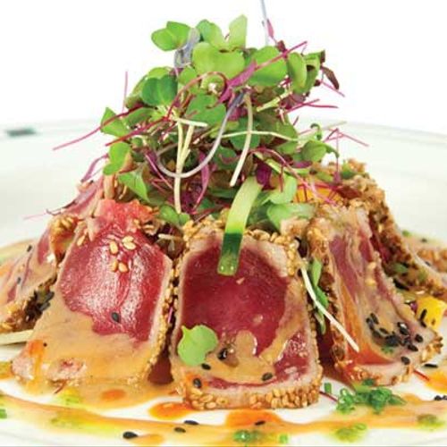 Sesame crusted ahi-tuna with cous-cous salad musta