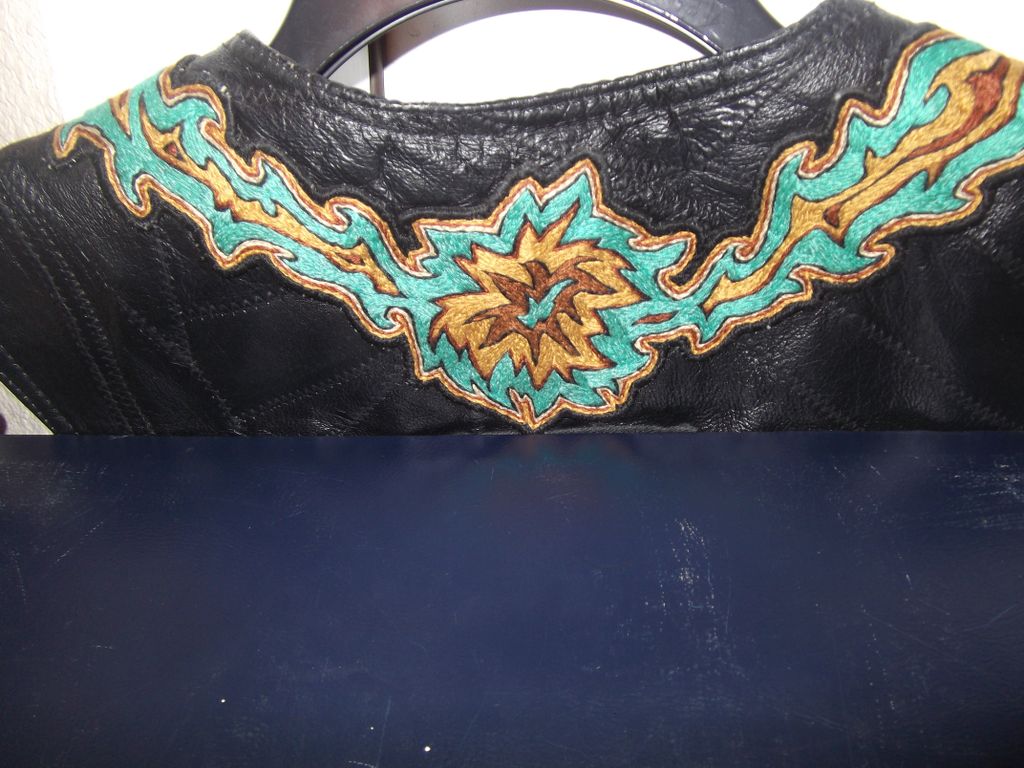 One piece Embroidery patch sewn onto a leather jac