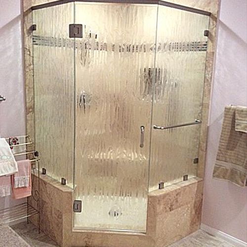 Neo-angle shower enclosure with bamboo glass.
