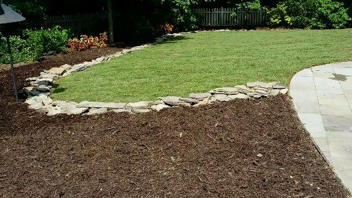 grading with sod and edge blue stone