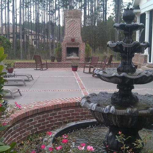 Outdoor brick fireplace and patio