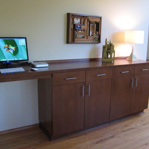 Built-In custom desk and cabinet for client who us