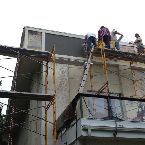removing and replacement of EIFS on Rey Maualugas 