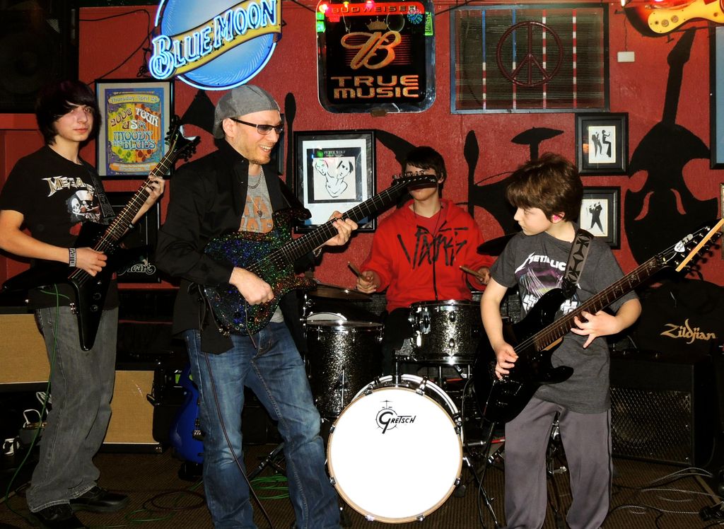 Students playing live at local club.