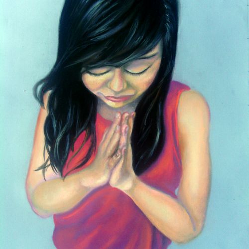 This is a pastel portrait of a little girl praying