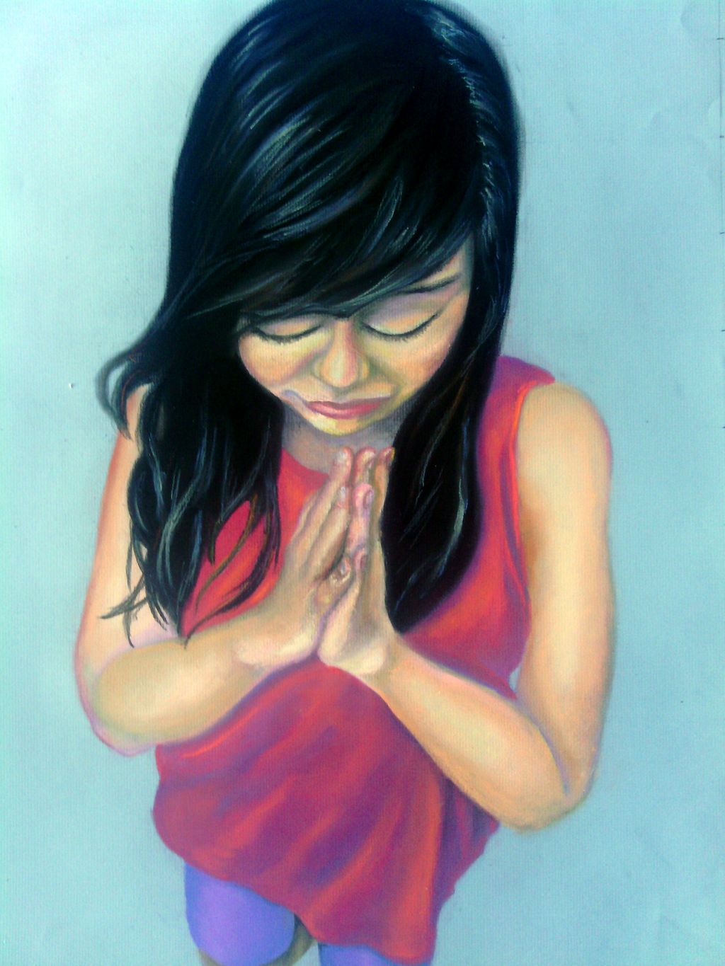This is a pastel portrait of a little girl praying