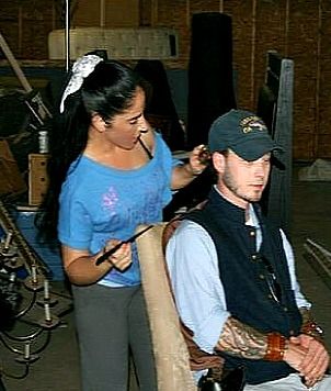 On set of movie doing hair.