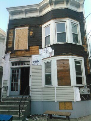 Vinyl siding being started