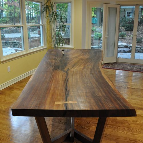A Large Walnut Dining Table