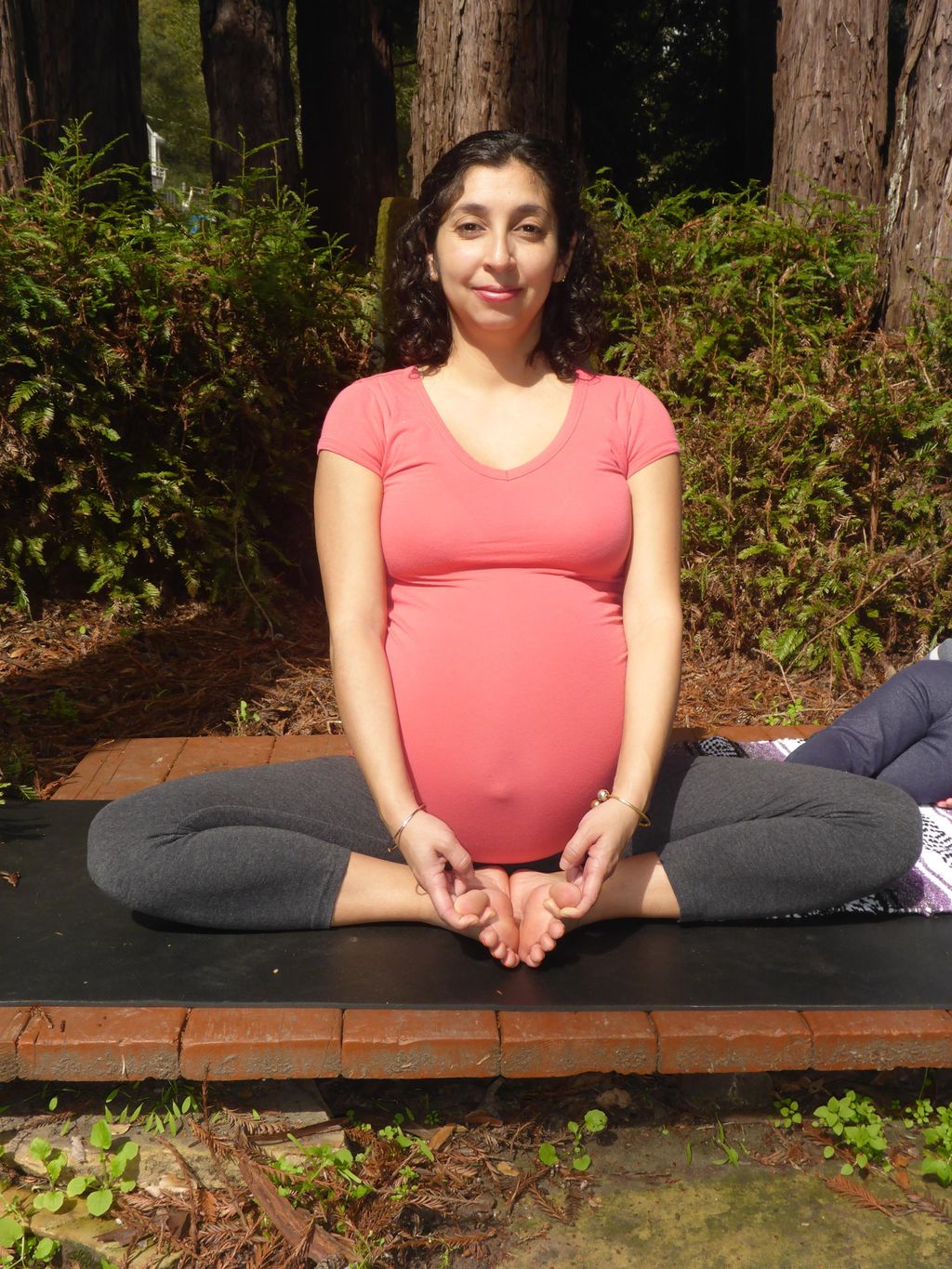 Instructor, Sonya Padron doing baddha konasana dur