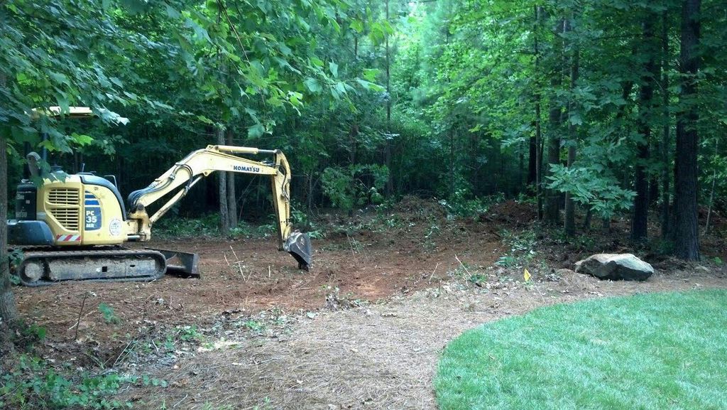 This is Triple C clearing land for a client. This 