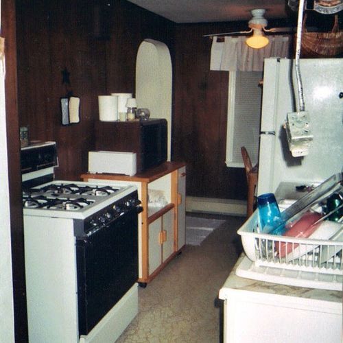 BEFORE:   very very old & tiny kitchen - both entr