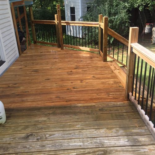 Applying deck cleaner then power washing. What a d