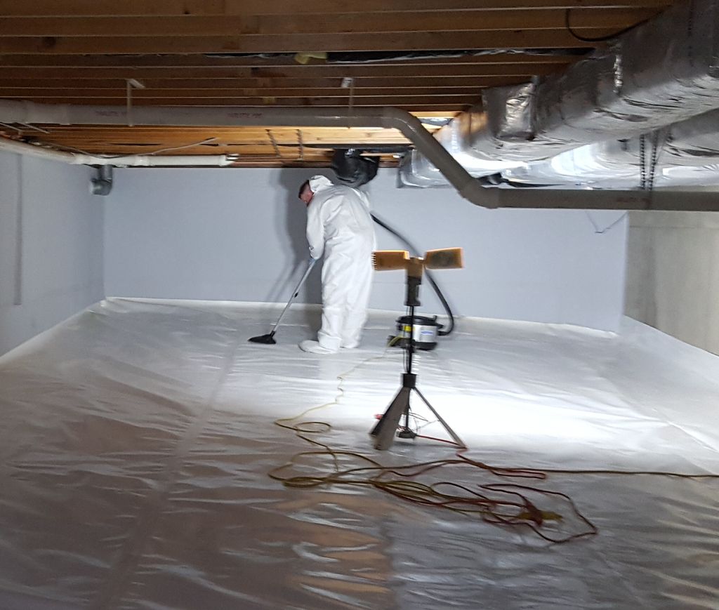 Basement crawlspace area encapsulated with foam bo