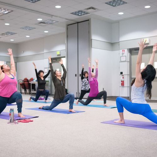 Leading yoga session at P&G