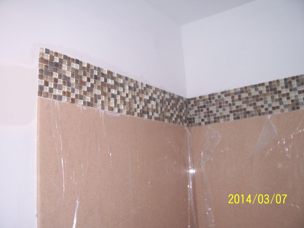 Onyx bathroom remodeling. Walls installation with 