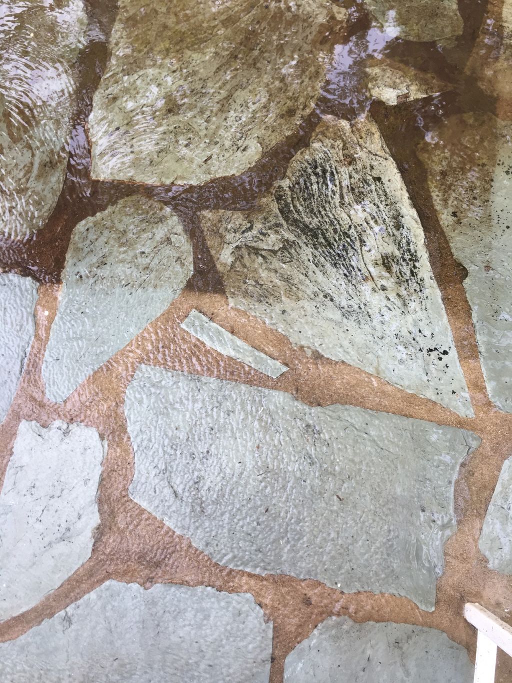 What a difference on this stone patio!