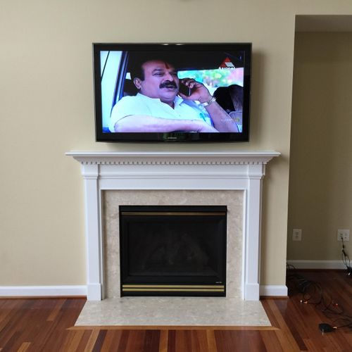 TV installation above fireplace that required pull