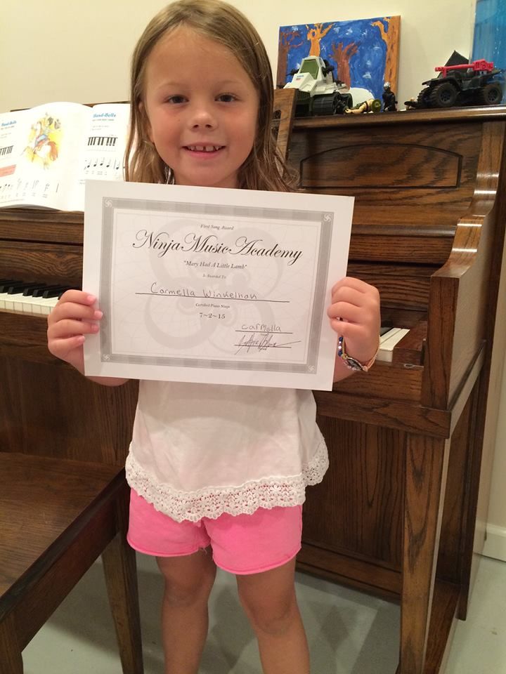 Carmella learned her first song.