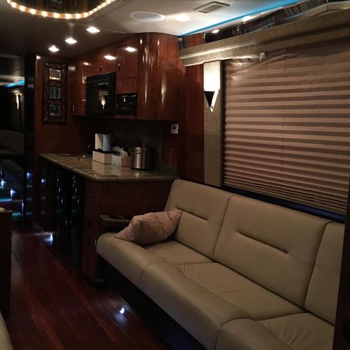 Brand-new luxury bus with bathroom and wet bar are