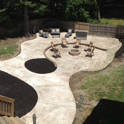 Stamped Concrete Patio with waterfall, fire pit an