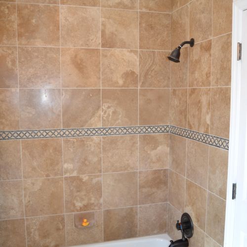 Matching tile theme throughout bathroom