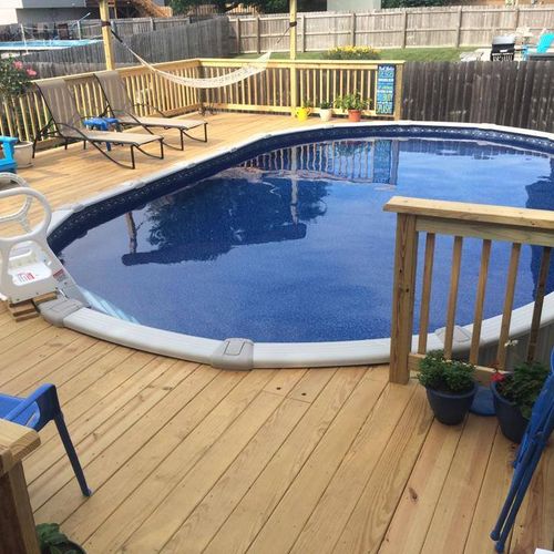 Brand new deck installed around homeowner's pool a