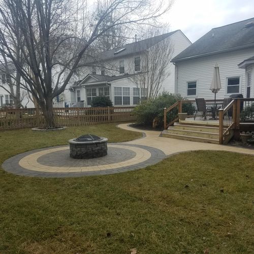 Hardscaping patio with fire pit, grading, sod inst