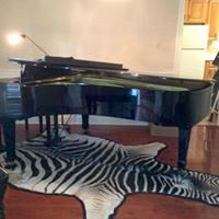 Piano and 6,000 sq ft house to New Orleans.