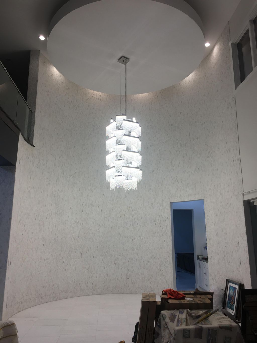 300 lbs 7 ft tall crystal chandalier installed wit