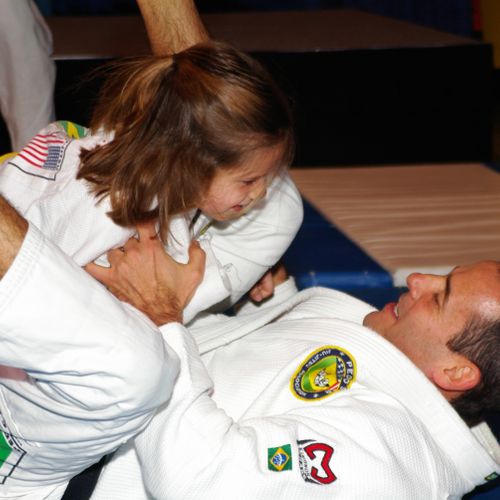 Professor Pedro Sauer training Jiu Jitsu with his 