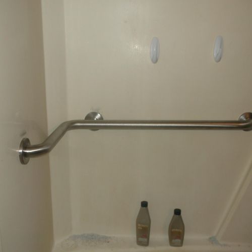 Installing Handicap rails in bathroom and shower.