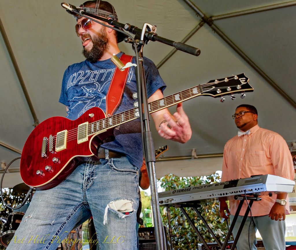 Guitar player at the Flint River Habitat for Human