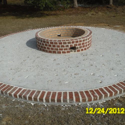 oyster shell concrete patio and fire pit.