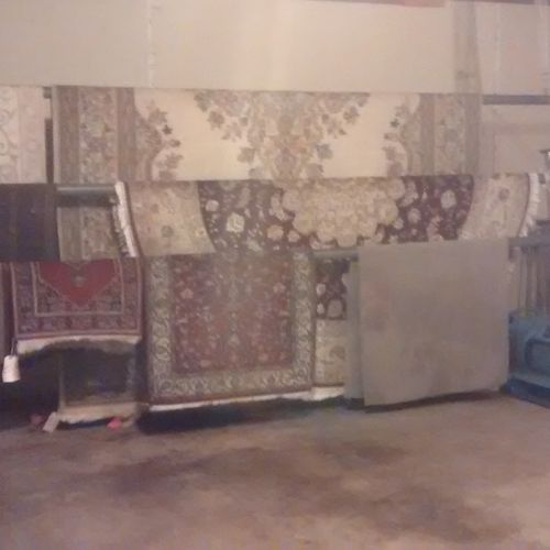 oriental rugs drying in our shop